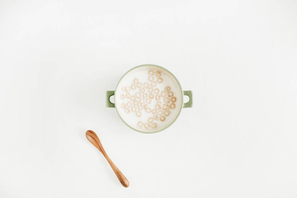 Cereals with milk on white background - Valokuva, kuva