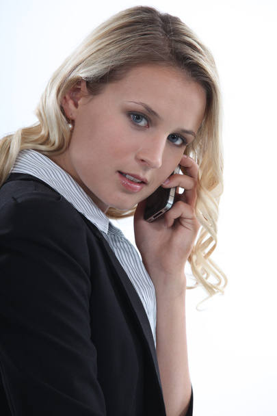 Businesswoman talking on her cell - Фото, зображення