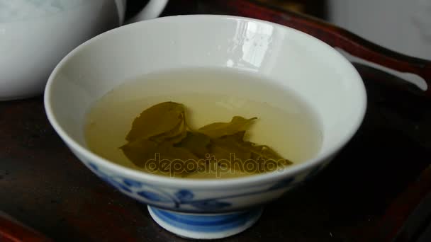 Tea rázva a teacup.china. - Felvétel, videó