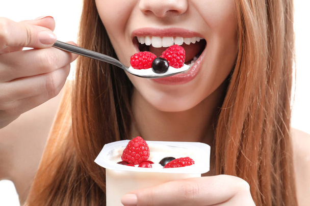 woman eating yogurt  - Φωτογραφία, εικόνα