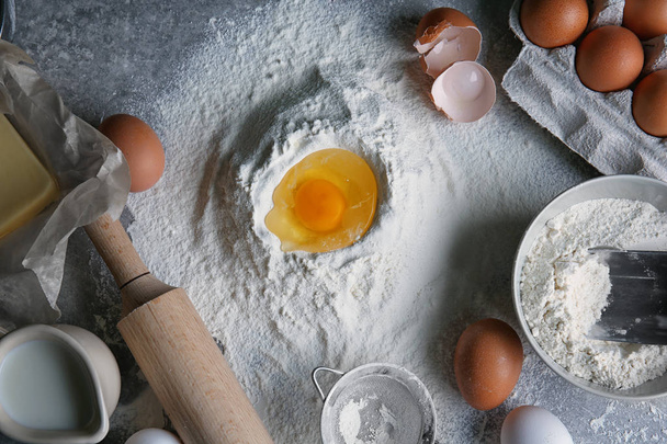 Ingredients for dough on kitchen table - Valokuva, kuva