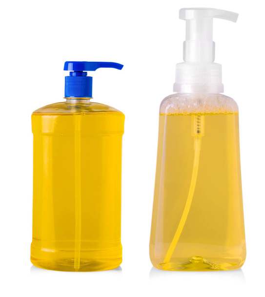 bouteilles en plastique orange avec détergent à lessive liquide, nettoyage un
 - Photo, image