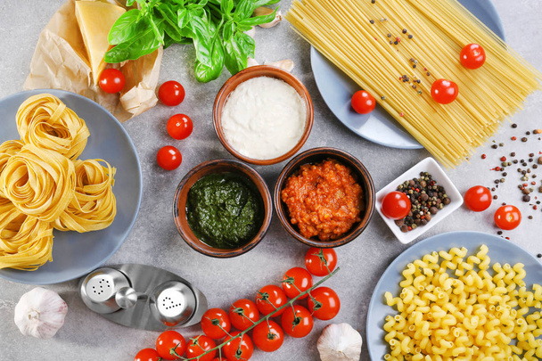 Composition with pesto, bolognese and white sauces for pasta - Foto, imagen