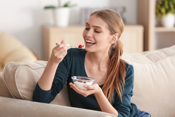 woman eating yogurt  - 写真・画像