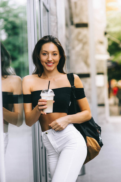 girl drinking coffee in the city - Photo, Image