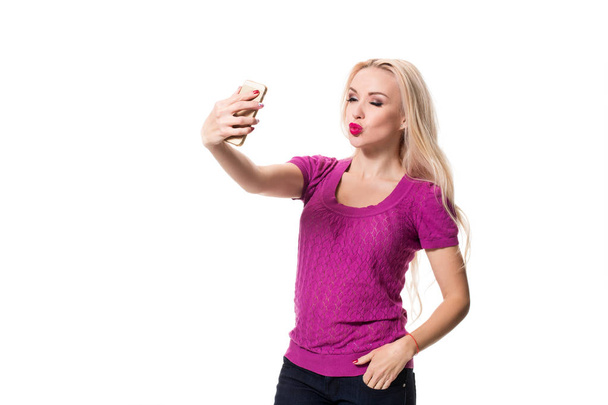 blonde doing selfie on isolated white background - Foto, Bild