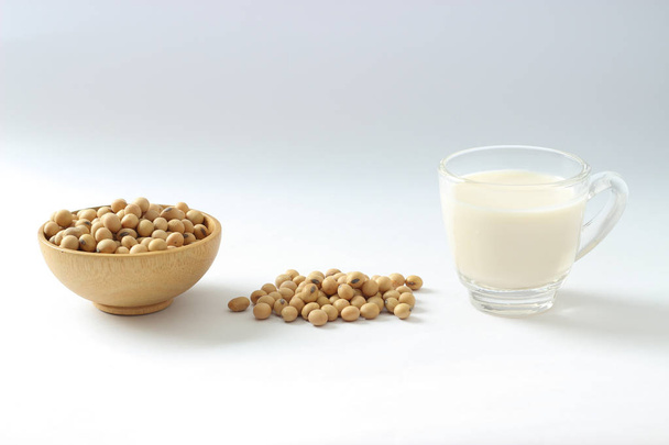 Isolate Soy milk and beans on white background. - Φωτογραφία, εικόνα