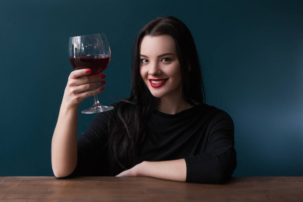 Joyful smiling girl in bar with wine - Foto, Imagem