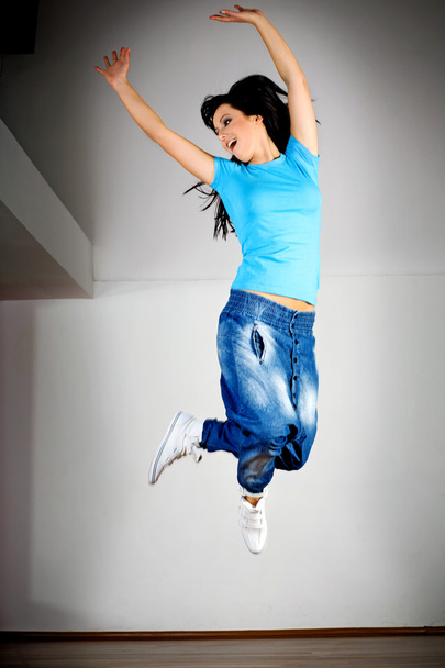 Jumping woman - Фото, изображение
