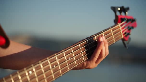 Bass guitarist playing music - Footage, Video