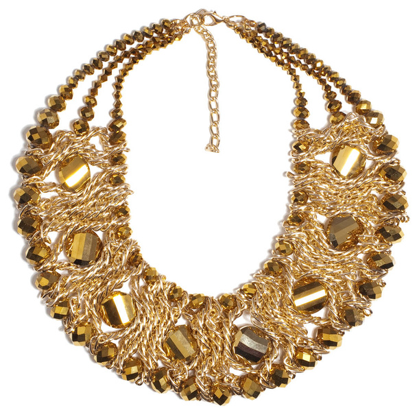 Beautiful luxury massive woman's isolated golden necklace made of chains, crystals, beads on a white background - Фото, зображення