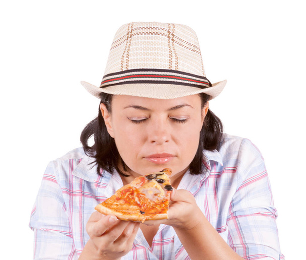 Hermosa joven comiendo una rebanada de pizza
 - Foto, Imagen