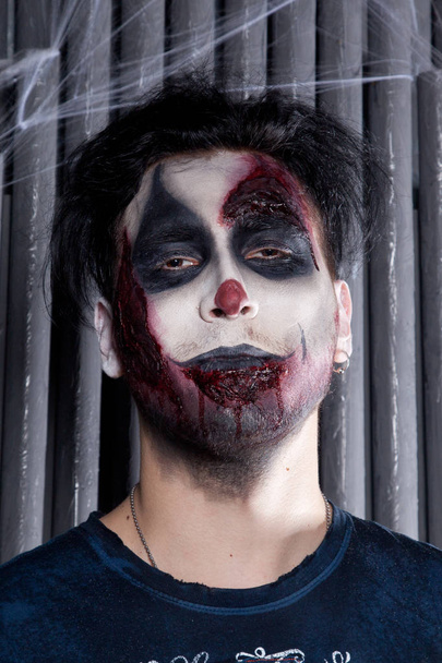 Gruselig blutiges, böses Clown-Porträt - Foto, Bild