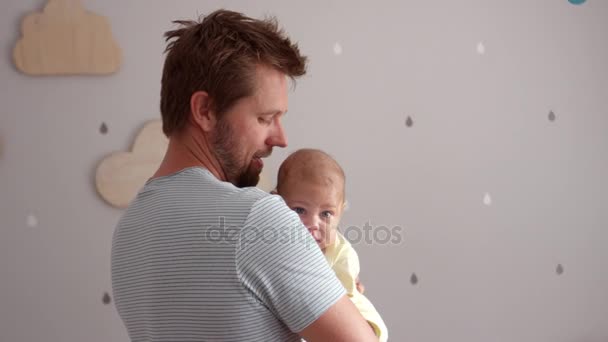 Father Comforting Baby Son - Кадры, видео