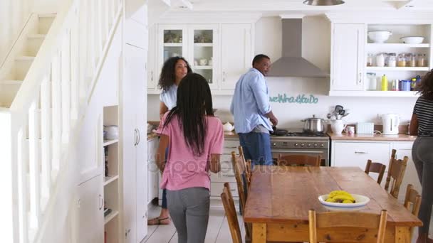 Family Laying Table For Meal In Kitchen - Filmmaterial, Video