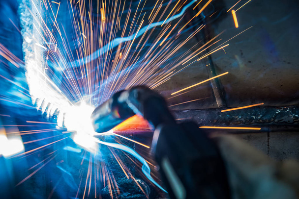 Industrial steel welder in factory technical, - Фото, зображення