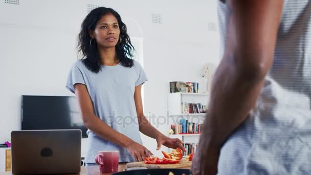 Young Couple Preparing Meal Together - Filmagem, Vídeo