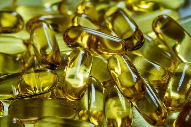 Fish oil supplement, medical and health concept - Foto, afbeelding