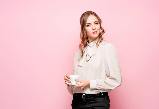 The serious frustrated young beautiful business woman on pink background - Photo, image
