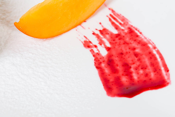 Red jam and mango closeup. - Foto, imagen