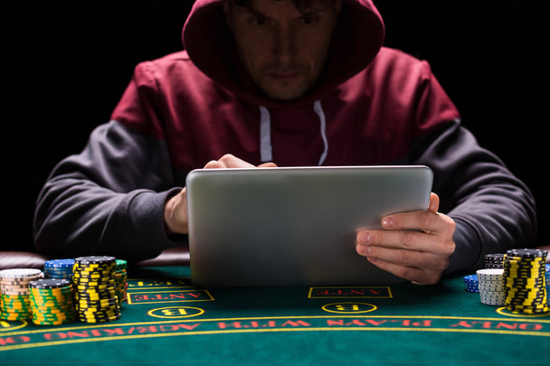 Online poker players sitting at the table - Fotoğraf, Görsel