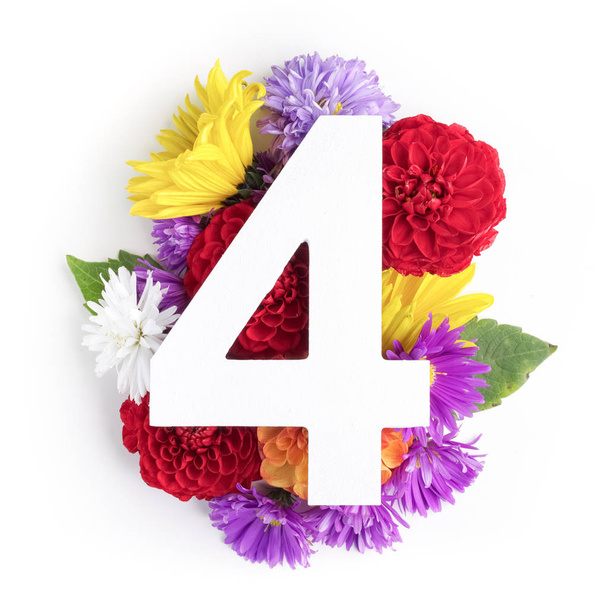 Layout with colorful flowers, leaves and number for. Flat lay. Top view. - Photo, image