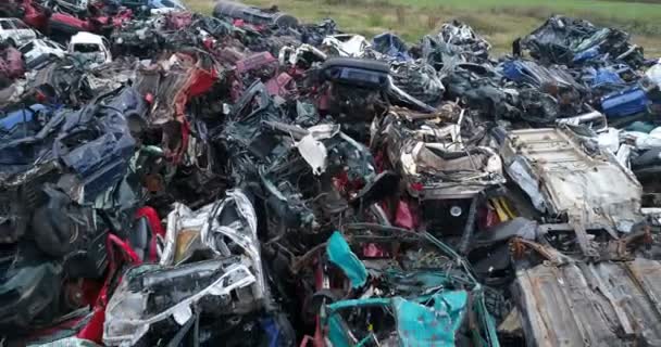 Crushed corroded old cars stacked in scrapyard.  - Footage, Video
