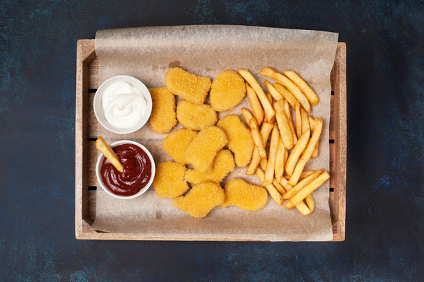 Chicken nuggets and french fries - Fotoğraf, Görsel