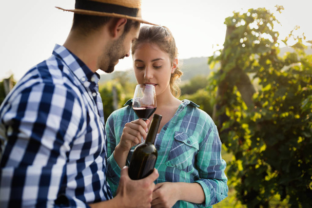 Couple in vineyard before harvesting - Photo, Image
