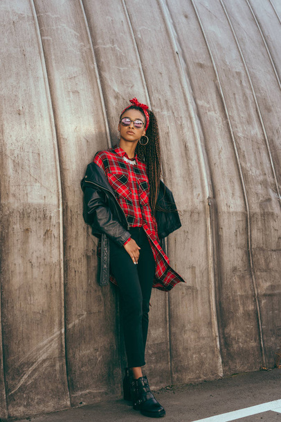 girl in leather jacket and checkered shirt - Photo, Image