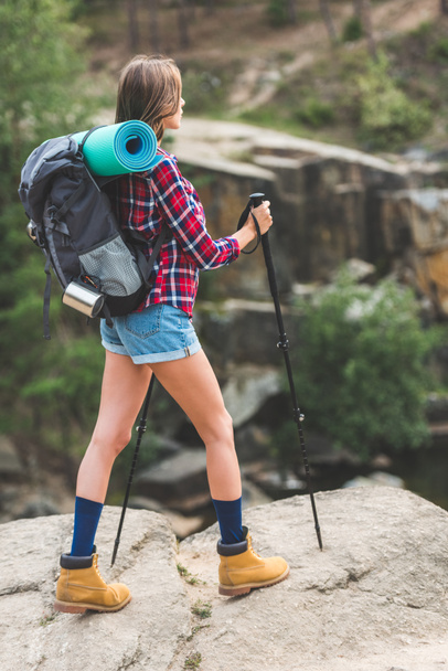 woman hiking on rocky mountains - Photo, Image