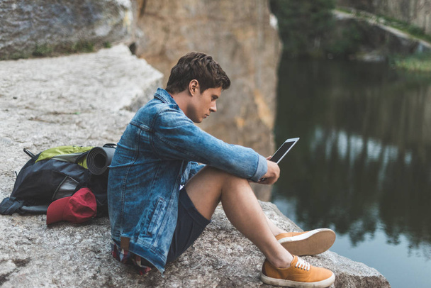 man using tablet on nature - Photo, image
