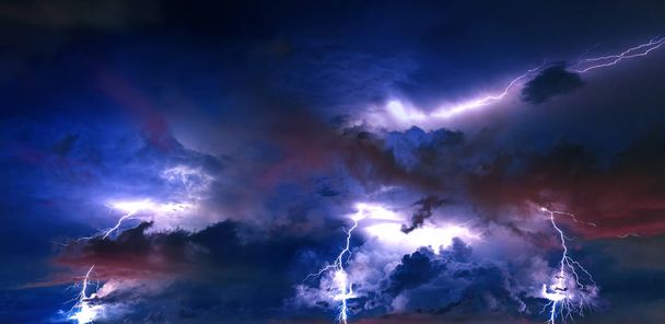 Thunderstorm clouds with lightning at night. - Photo, Image