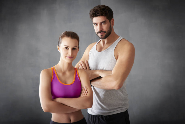 Sporty young couple at the gym - Foto, Imagem