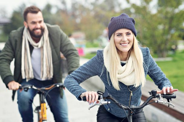 Young couple riding bikes  - Photo, Image
