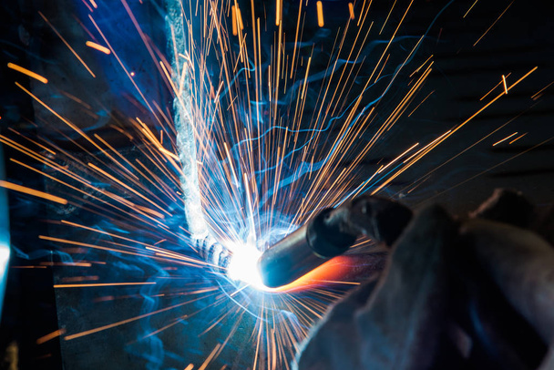 Industrial steel welder in factory technical, - Fotoğraf, Görsel