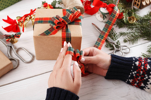 Gift wrapping. Packaging modern christmas present in boxes - Φωτογραφία, εικόνα