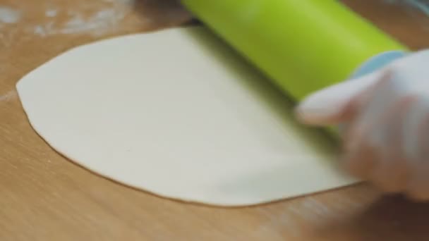 Woman rolling dough for pizza - Footage, Video