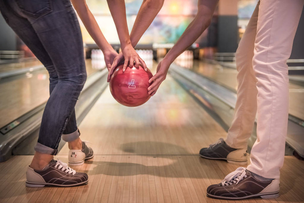 Couple playing bowling  - Фото, зображення