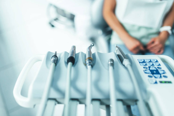 Dental instruments on dental chair  - Fotografie, Obrázek