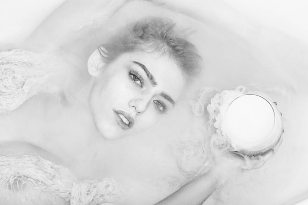 Closeup of woman with glass in bath - Foto, Bild
