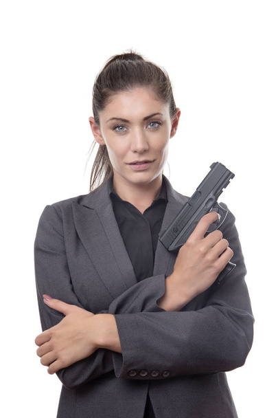 επιχειρήσεων γυναίκα με πυροβόλο όπλο χεριών - Φωτογραφία, εικόνα