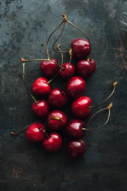 Ripe cherries on grunge background - Photo, Image