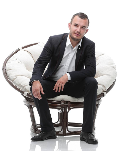 young businessman sitting in a comfortable chair - Photo, Image