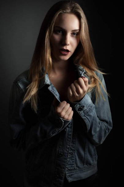 Woman in denim jacket - Fotoğraf, Görsel