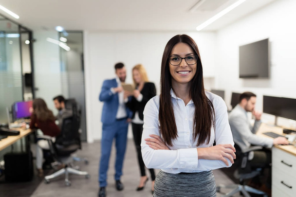 young businesswoman posing in office - Photo, image