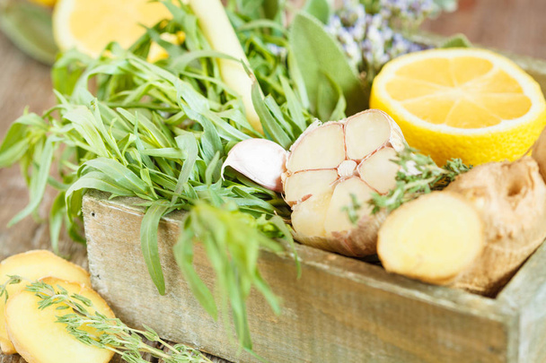 ingredients, condiments and herbs in a wooden box - Photo, image