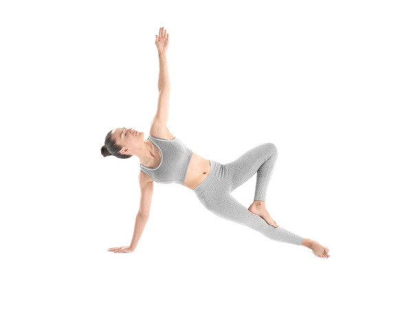 Young beautiful woman doing yoga - Foto, afbeelding