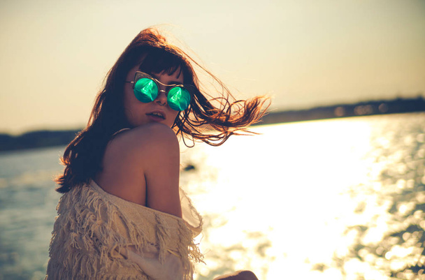 Styled girl at the beach during sunset  - Φωτογραφία, εικόνα