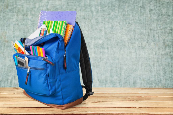 School Backpack with stationery - 写真・画像
